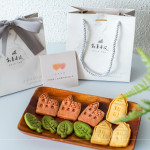 伴手禮贈送『迦南園烘焙庇護(hù)工場』的公益餅乾，可愛、溫馨兼顧著美味，為這場活動增添一份愛的溫度。